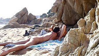 Couple Caught In The Act At A Beach