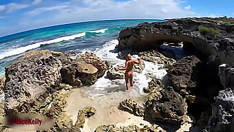 Watch As This Stunning Young Woman Pleasures Herself Near The Ocean